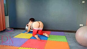 Nude Yoga Regina Noir Shows Woman in Tight Leotards Practicing Stretches in Gym