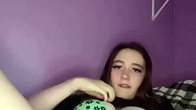 young amateur teen pulls her panties aside during solo webcam session to finger and rub her pretty puffy pussy