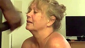 Granny Takes Huge Facial From Big Black Cock Cumshot!