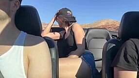 Brunette bent over car gets fucked by two guys in public desert outdoor scene
