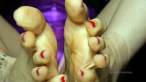 Sweat-covered small 18+ feet mistress with red toenail polish dominates sensually