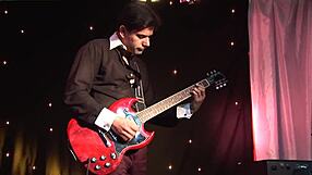 so this guitarist is with a cute blonde girl in a skirt and stockings doing all sorts of things like licking and riding then he finishes by spraying her with urine