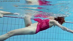 I'm Anna Netrebko, teasing softly in my bikini while swimming underwater in this petite Russian solo.