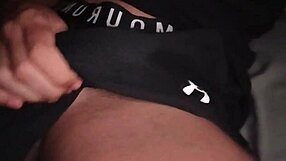 I love stroking my huge dick in these tight gym shorts, moaning so loud while I jerk off hard on the bed