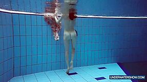 Martina the Croatian redhead keeps up her beach show in bikini