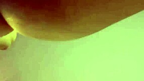 pretty curvy milf with big tits and tattoo poses solo on camera