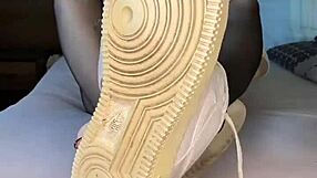 hey, check out this black nylon feet fetish with nike air force tights on that girl