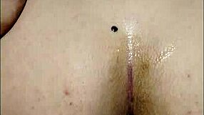 Subtle hints of first-time anal play with toy in bedroom or office