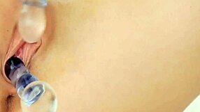 Teen babe masturbates nude with huge dildo fingering her wet pussy in solo toy play.