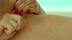 Teen babe masturbates nude with huge dildo fingering her wet pussy in solo toy play.