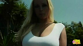 two busty blondes in bikinis have their lesbian sexy time in the pool