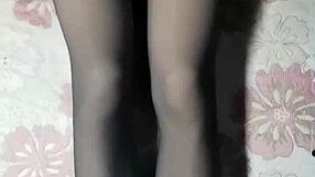 Hey, check out this crossdresser in black pantyhose and short jeans