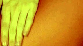 She spreads her big ass in closeup view while masturbating red pantyhose over shaved pussy