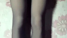 Hey, check out this crossdresser in black pantyhose and short jeans