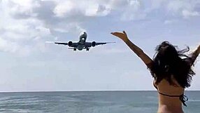 Monika Fox poses solo in pink bikini with stars on the beach showing big fake tits free