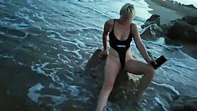 blonde shows tits and sucks cock on a public beach with brunette watching