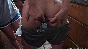 Asa Akira Skillfully Inserts Buttplug into Charley Chase during Intense Lesbian Toy Session