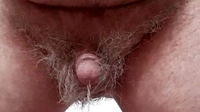 Hey, watch me pissing for my friends in this amateur solo small cock mature neighbors clip.