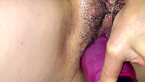 Whoa, shoving that fake cock into her swollen pussy!