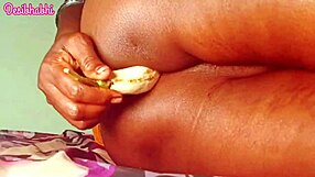 Watch This Sexy Desi Bhabhi Take a Cucumber Deep in Her Tight Ass for Wild Anal Pleasure!