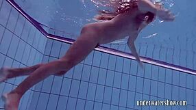 Does Lucy Really Remove Her Bikini While Swimming in the Pool?