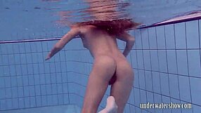 Does Lucy Really Remove Her Bikini While Swimming in the Pool?