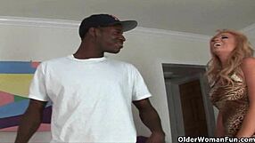 Oh man, this mature milf is getting pounded hard by that massive black cock in interracial action