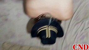 In the dorm, the Brazilian girlfriend bends over on the bed as the husband watches her scream during intense action