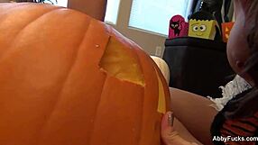 abigail mac contrasts big tits and brunette allure in intriguing halloween pussy solo masturbation