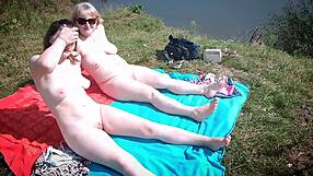 Mature Mommy and Young Girl Naked Sunbathing Turns Wild Beach Lesbian Fuck!