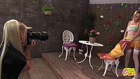 during the photoshoot busty blonde lesbians cindy behr and paige ashley strip to lingerie then lick pussies and share dildos to orgasm