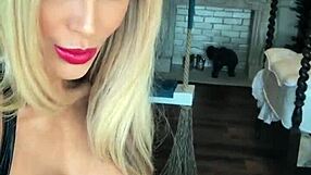 Wetlook suit clings tight as leather boots tease hidden curves in sultry display.