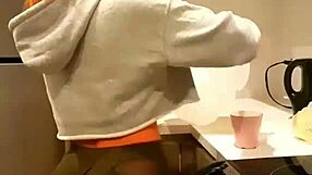 Hey, watch her grind and shake that ass perreando right in the kitchen