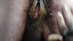 granny shoves cucumber deep in hairy wet pussy!