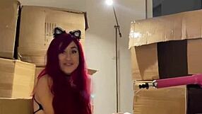 Redhead teen strips sexy then preps machine dildo in her mouth