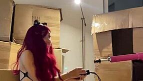 Redhead teen strips sexy then preps machine dildo in her mouth