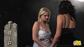Lesbian friends enjoy intimate games in the graveyard