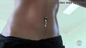 Brandis Pierced Belly Button Teases in Ebony Fetish Clips