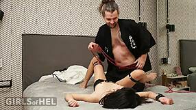 asian model feels intense rough thrill in leather cuffs rope bondage