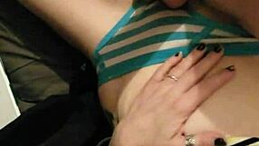 her fingers slide deep into wet pussy through striped cotton panties teasing endlessly