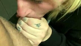 blonde slut deepthroats cock in public cinema bathroom