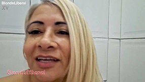 Amateur latina milf slut pisses sensually solo in bathroom