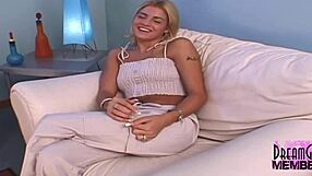blonde smokeshow marcelis bares shaved pussy on sofa