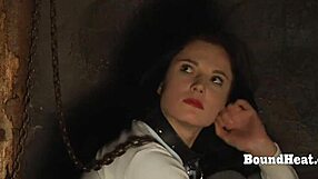 gagged lesbian slave bound tight as madame whips her big ass tits mercilessly