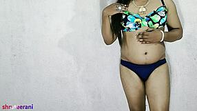 indian shemale in blue bikini strokes her big cock solo crossdressing tease