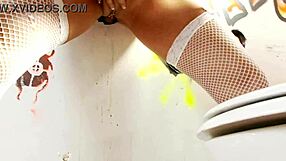 busty slut grabs anonymous cock from gloryhole wall sucks deep spits cum!!