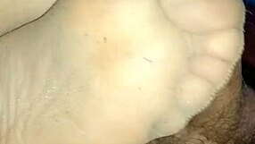 my girlfriend gives homemade sensual footjob teasing toes in tan stockings