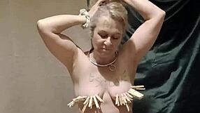 Watch this chained French maid strip tease with nipple clamps belt and explosive vibrator orgasm