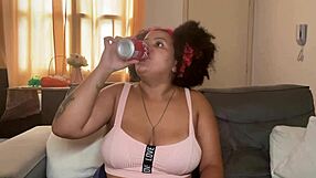 Drunk chubby ebony babe with huge saggy tits drinks coke burps farts and spreads curvy ass