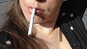 Kelly Kendricks Bares Massive Cleavage Smoking in Bright Sunlight